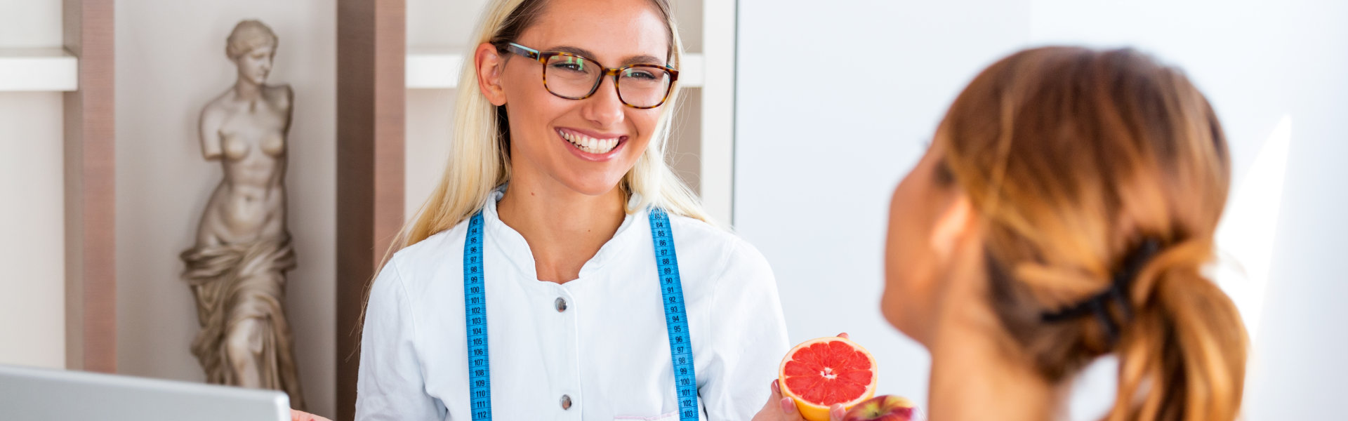 fitness doctor talking to her patient
