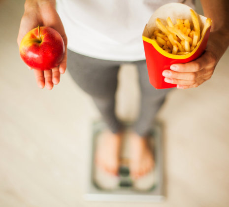 woman weighing herself